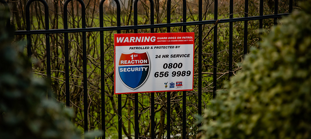 1st Reaction sign on a fence